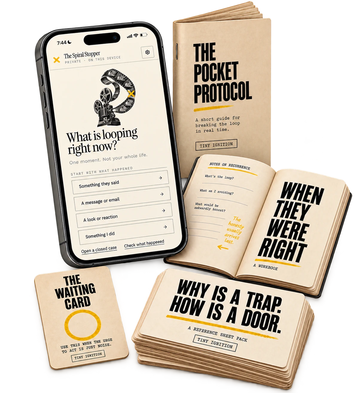 The Spiral Stopper app on a phone beside the four printed companion pieces